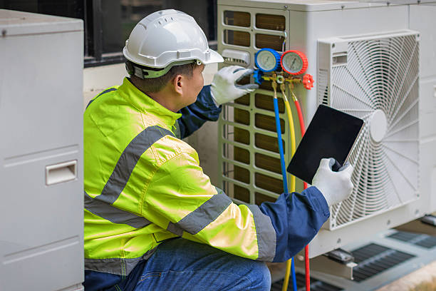 Professional Air Conditioning Repair technician working in Corunna, MI